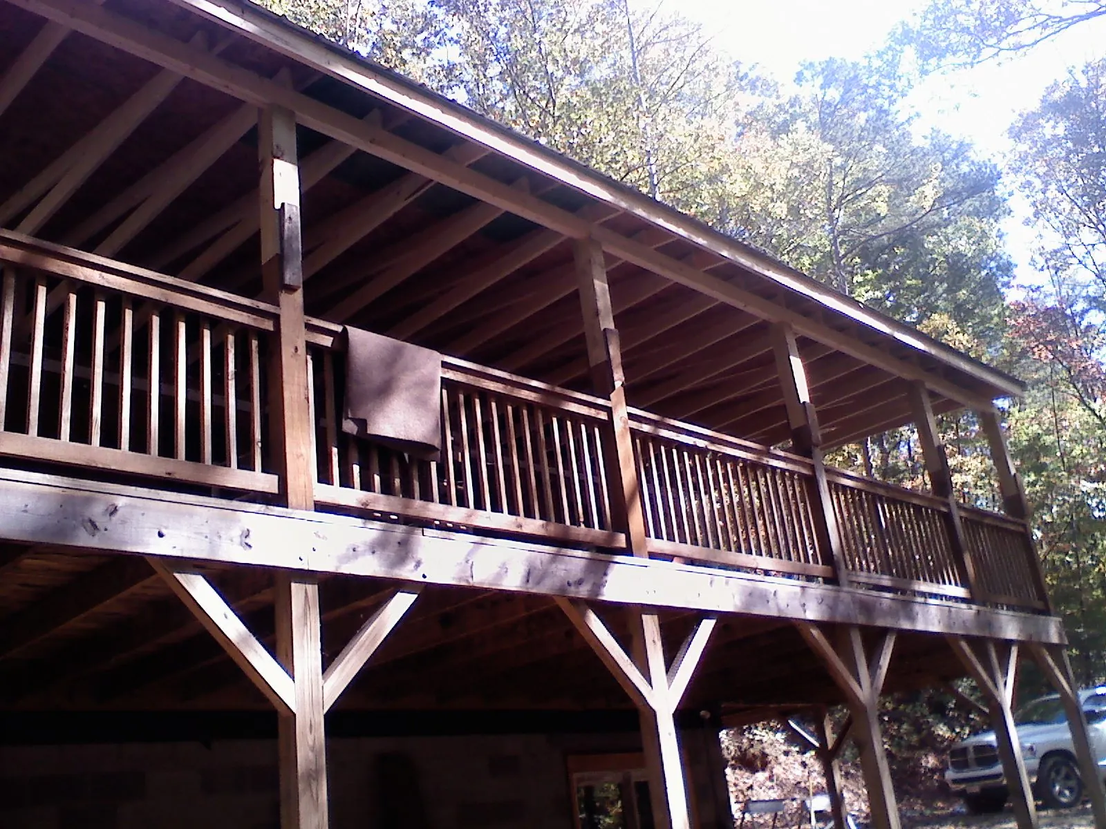 Timber framing under a new elevated porch and deck — Roof Leak Repair in Tupper Lake by Roofing Brothers